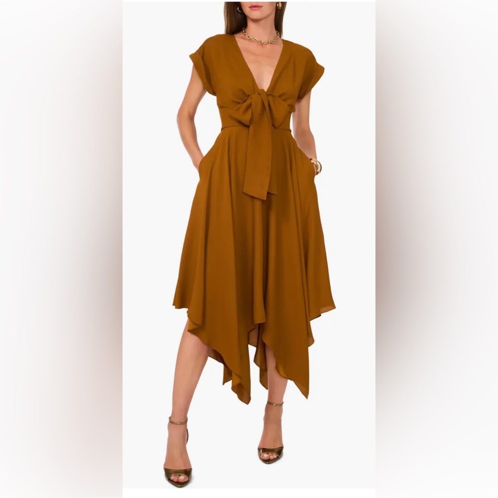 1.STATE
Women's Midi Tie-Front Handkerchief-Hem Dress It has no tags.
